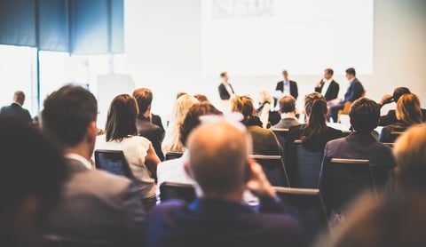 Conference hall with audience at a financial workshop event